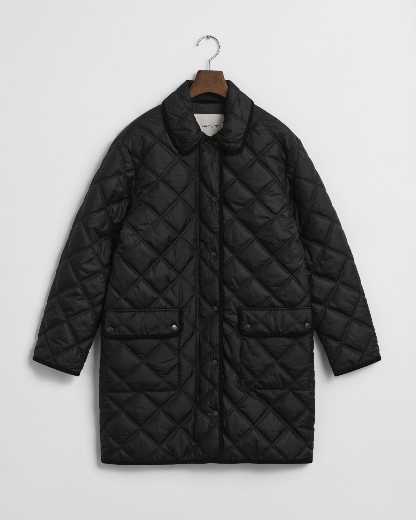Manteau matelassé avec finitions en velours côtelé