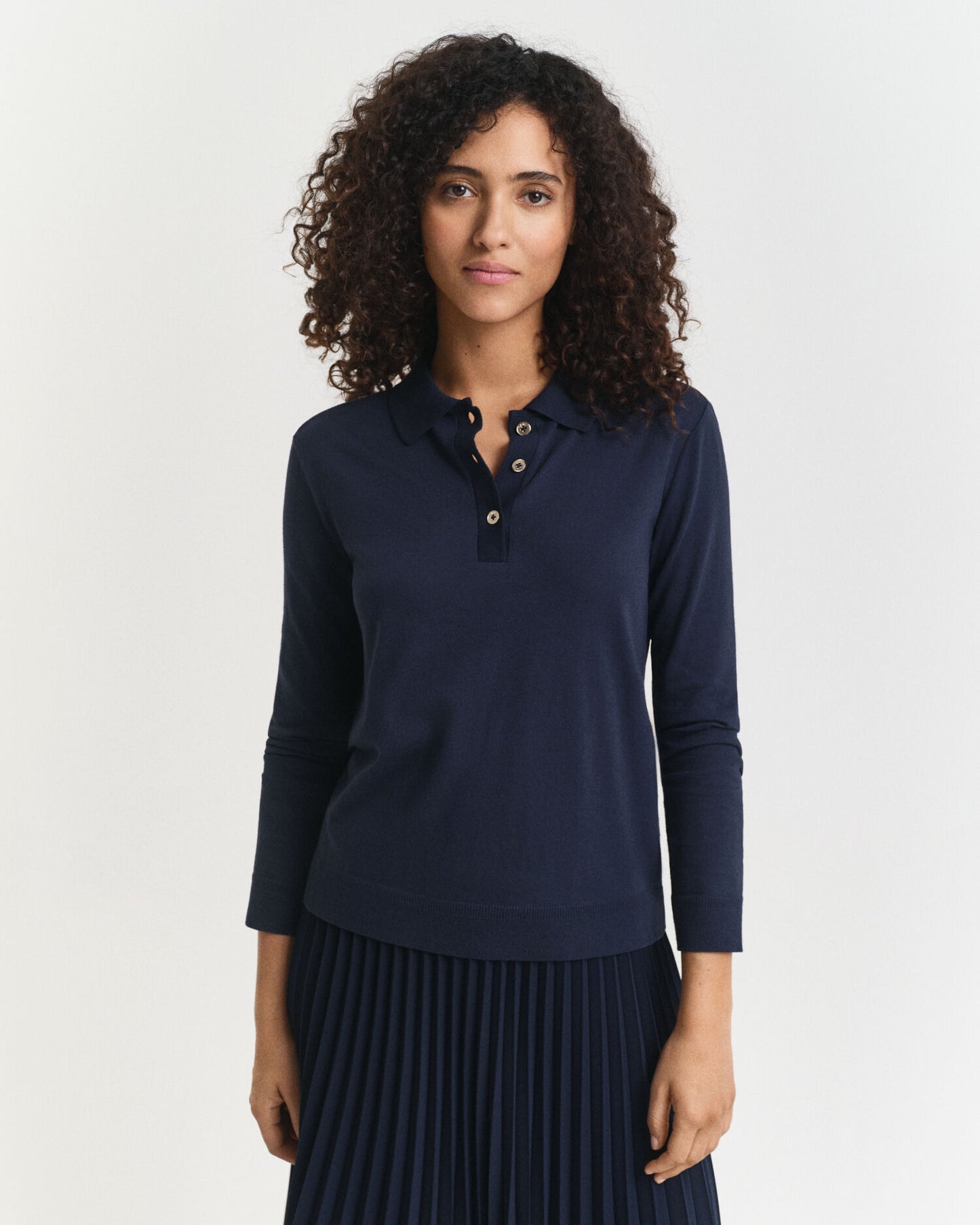 Polo à manches longues sans coutures et boutonné