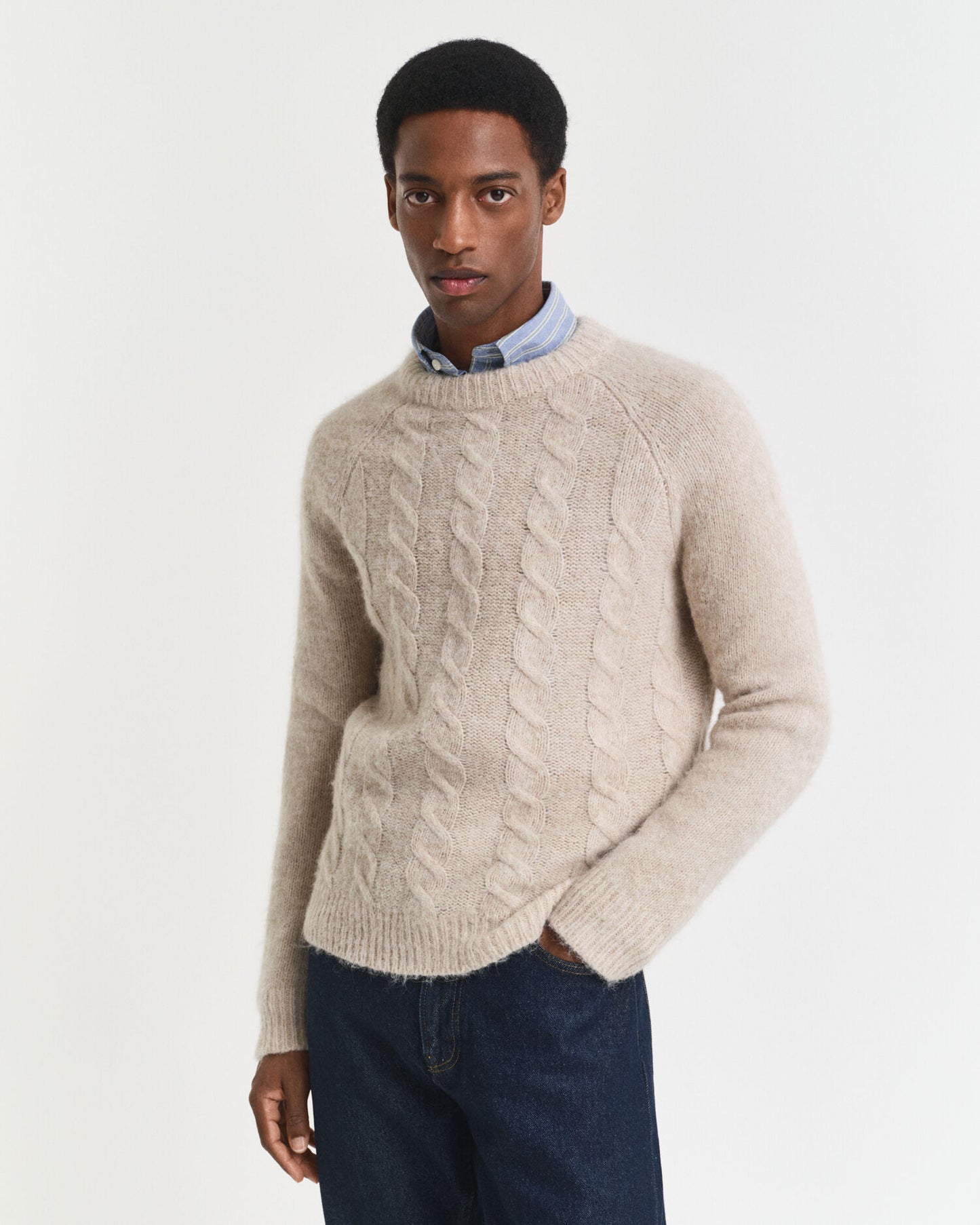 Pull ras du cou en maille torsadée