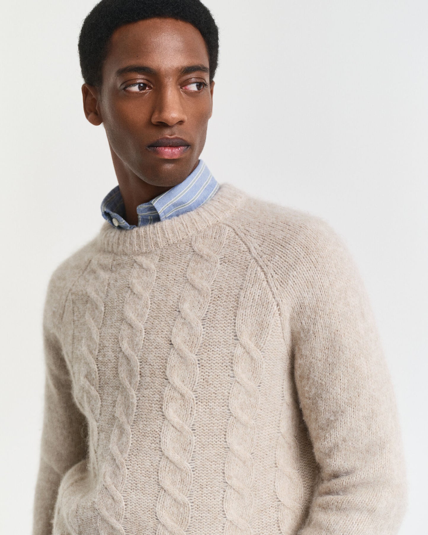 Pull ras du cou en maille torsadée