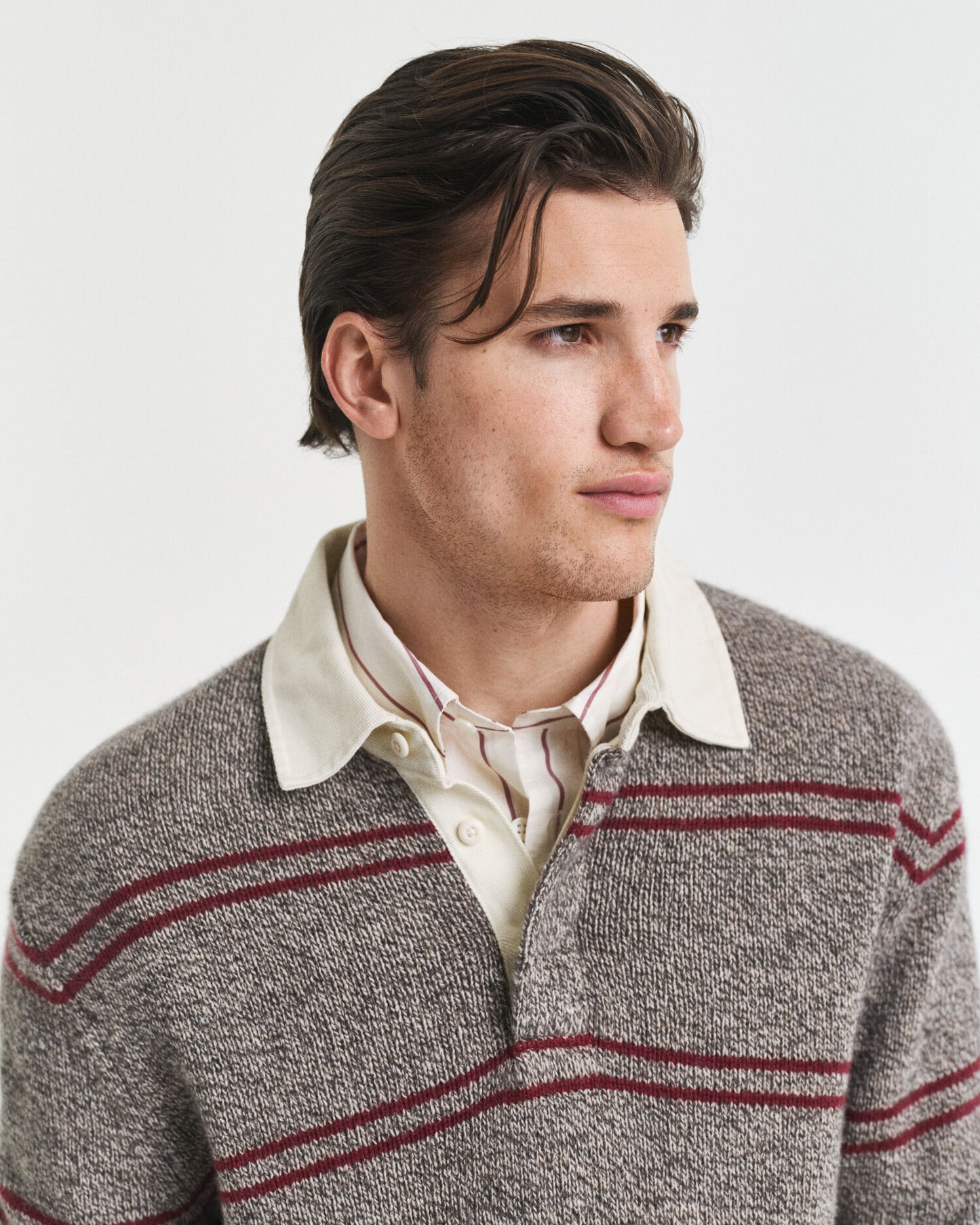 Pull polo en maille de laine mélangée à rayures