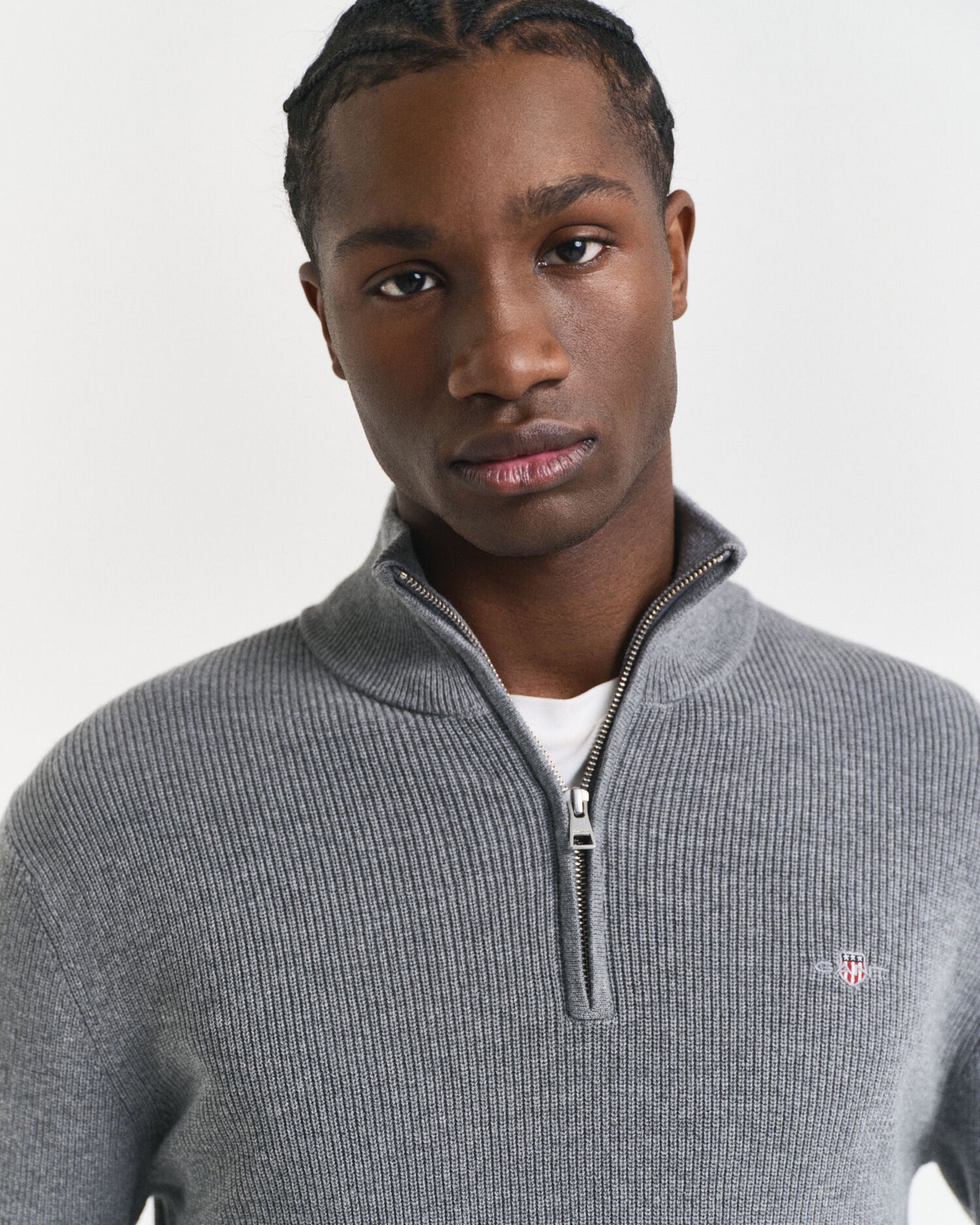 Pull en coton et laine mérinos côtelé à demi-glissière