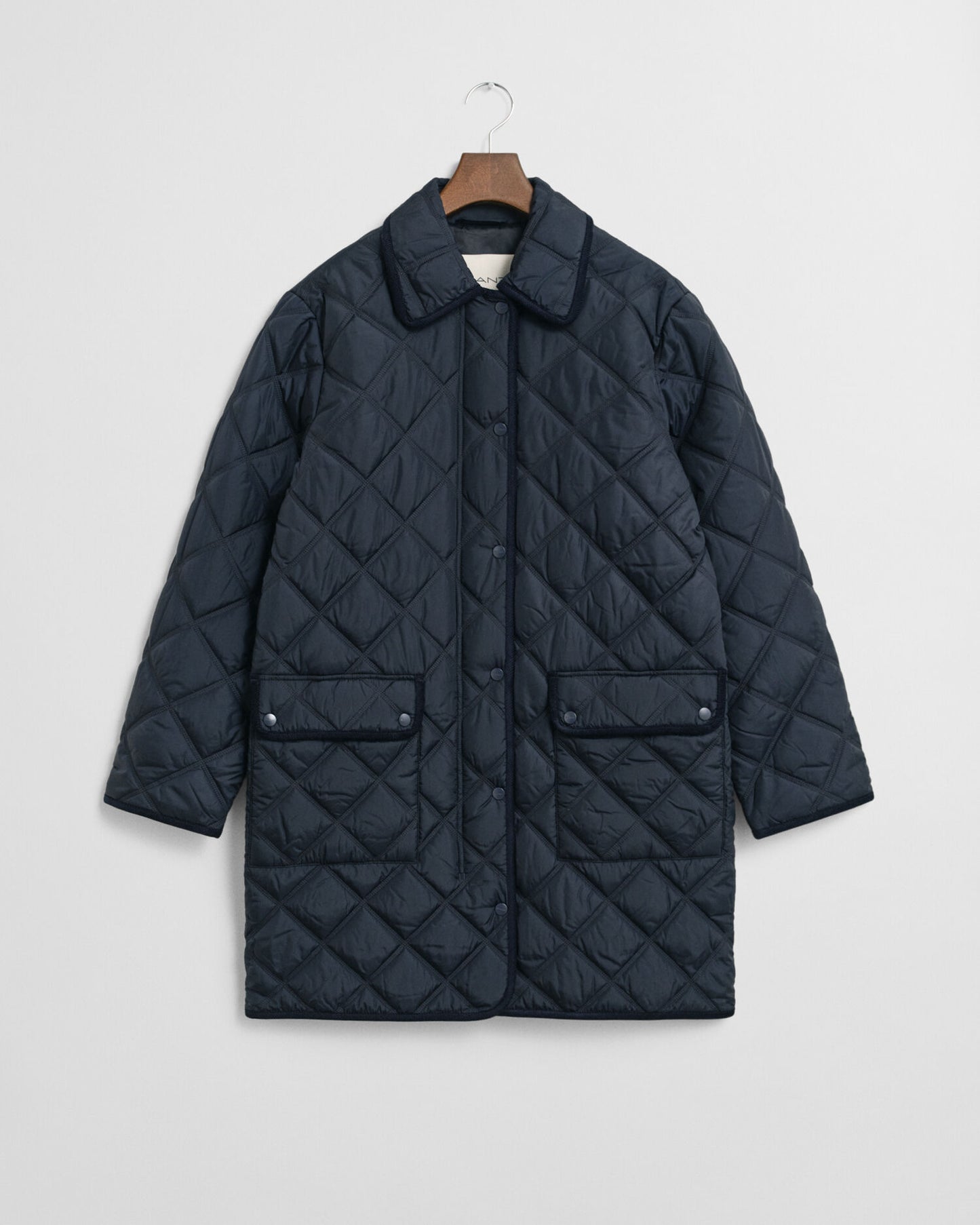 Manteau matelassé avec finitions en velours côtelé